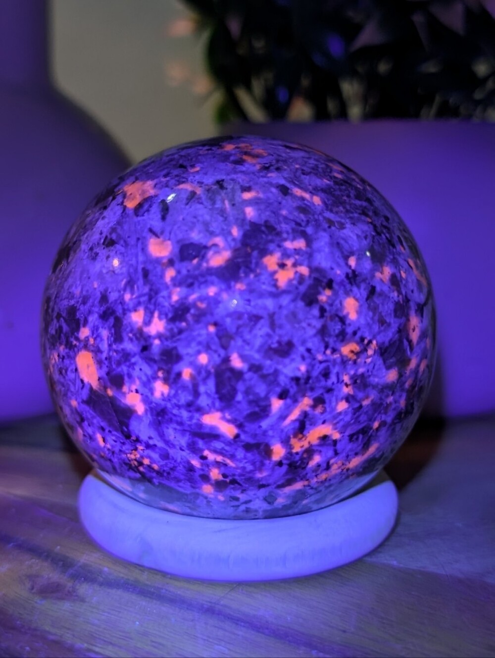 Glowing Fluorescent Yooperlite Decorative Sphere - Purple with Orange Accents